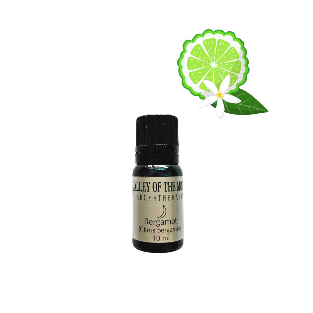 Bottle of Valley of the Moon Aromatherapy Bergamot essential oil with a lime graphic on a white background