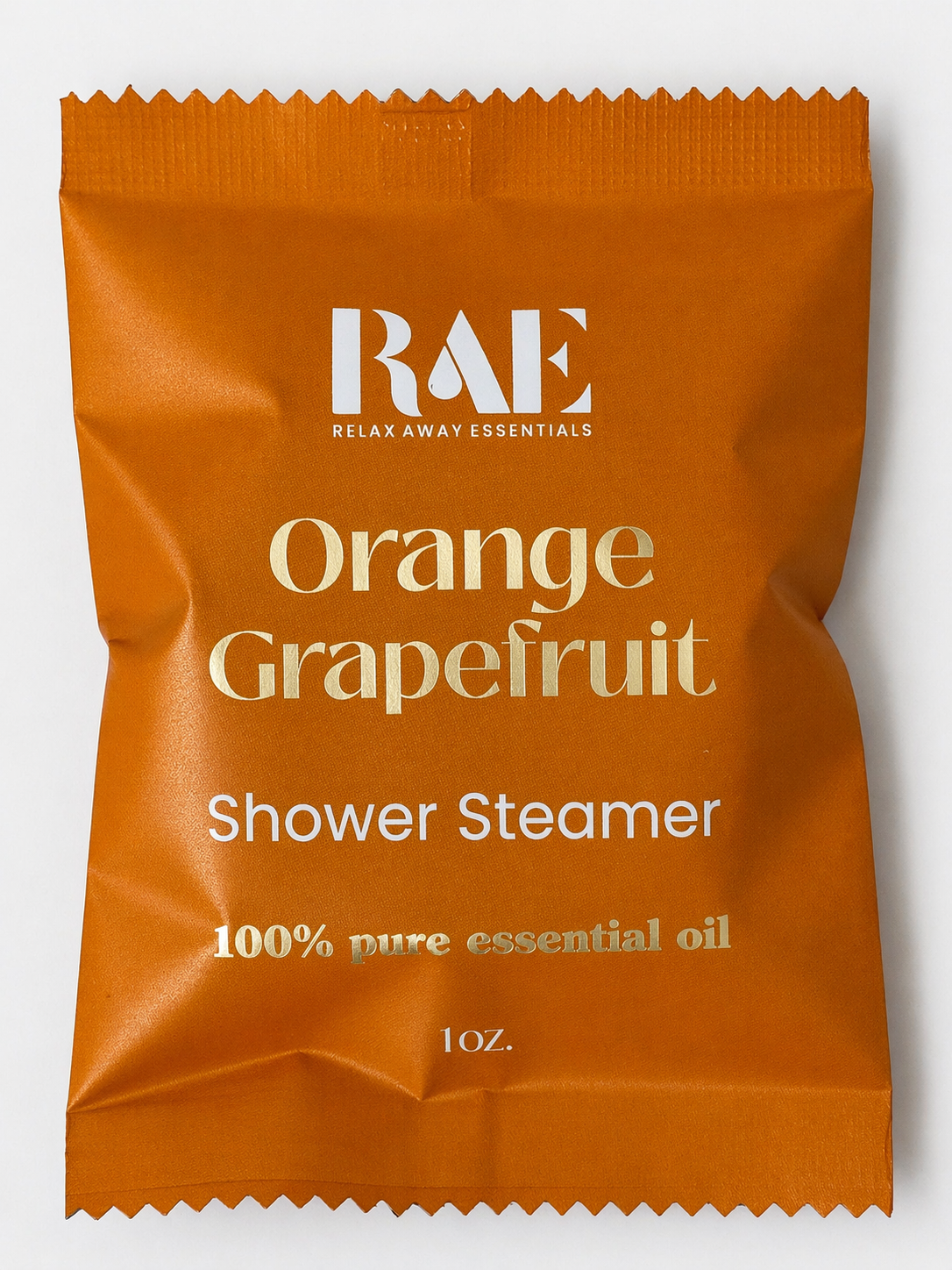 Orange Grapefruit shower steamer packaging with RAE branding on a white background