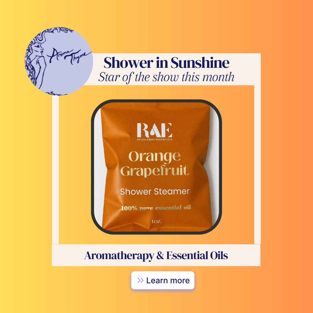 A promotional graphic for a shower steamer package. The central product is an orange pouch labeled 'RAE Shower in Sunshine Orange Grapefruit Shower Steamer' with '100% pure essential oil' text.
